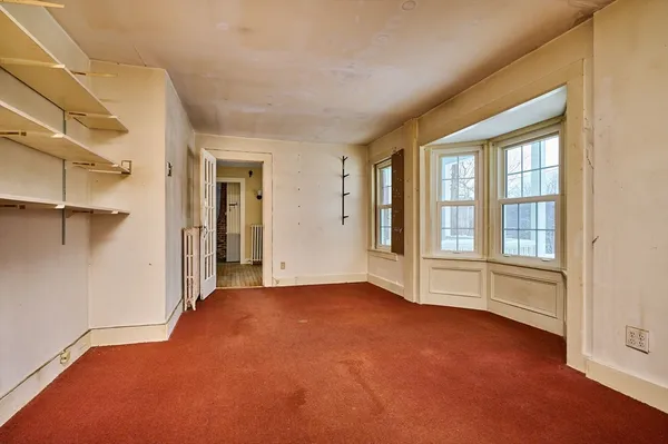 an empty room with windows