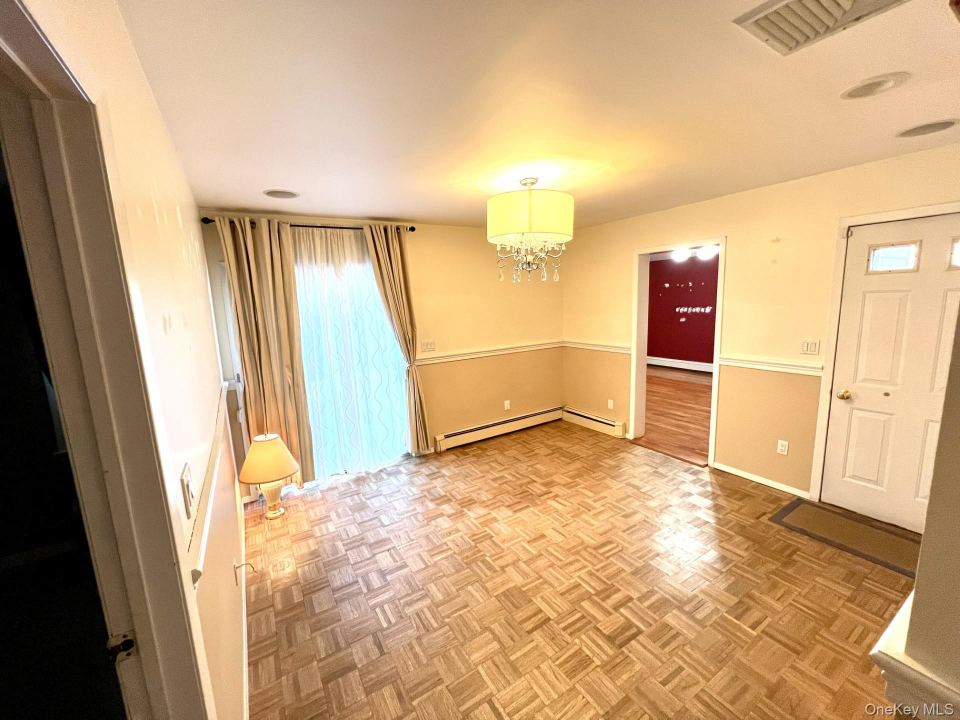 2341 Westley Road Westbury, NY 11590 - Photo 3 of 15 a view of a room with a sink and refrigerator