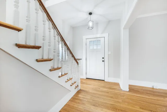 a view of a hallway with windows