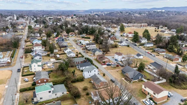 a picture of a bathroom with a shower