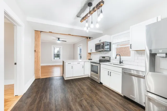 a close view of a sink and a window
