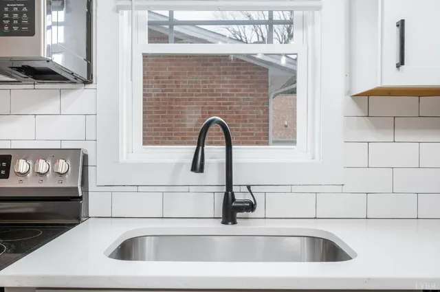 a view of a window in a white room