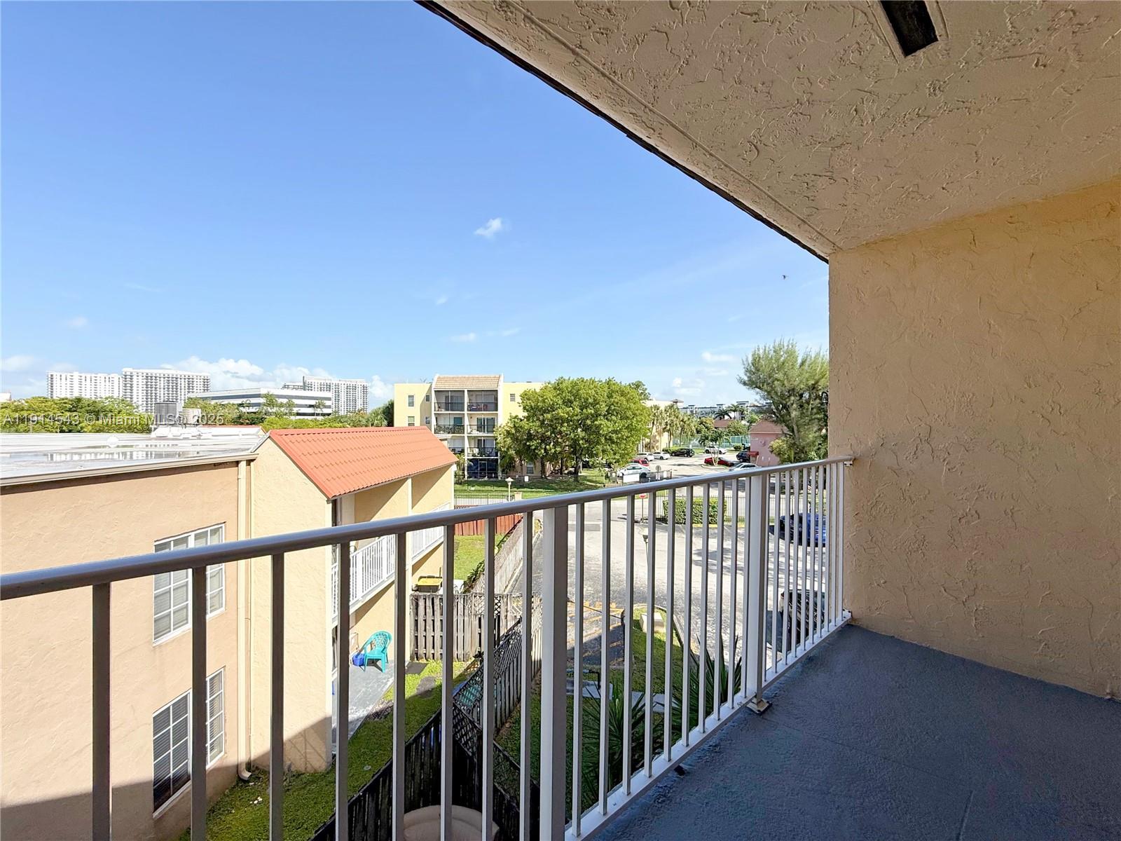 5231 Geneva Court, Unit 307 Doral, FL 33166 - Photo 19 of 26 a view of city from a balcony