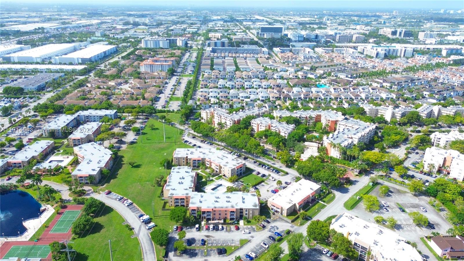5231 Geneva Court, Unit 307 Doral, FL 33166 - Photo 22 of 26 an aerial view of residential houses with outdoor space