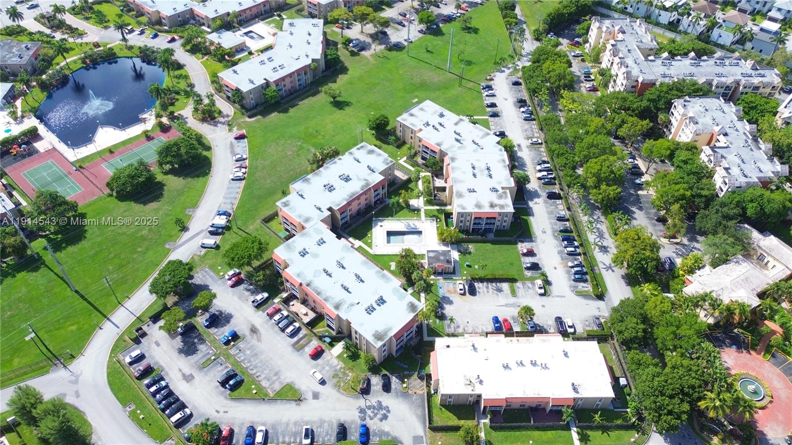 5231 Geneva Court, Unit 307 Doral, FL 33166 - Photo 23 of 26 an aerial view of a houses with yard