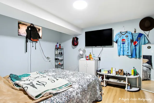 a room with furniture and a flat screen tv