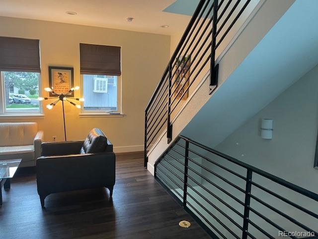 1204 South Reed Street Lakewood, CO 80232 - Photo 14 of 28 a living room with furniture and a stairs