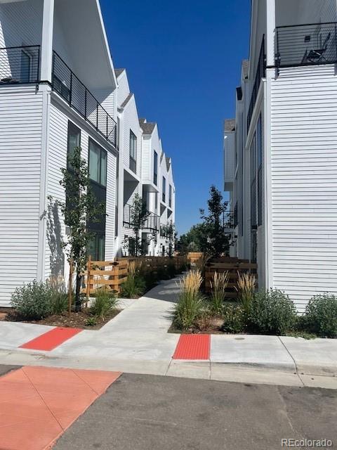 1204 South Reed Street Lakewood, CO 80232 - Photo 2 of 28 a view of backyard of the house