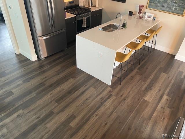 1204 South Reed Street Lakewood, CO 80232 - Photo 7 of 28 a utility room with washer and dryer