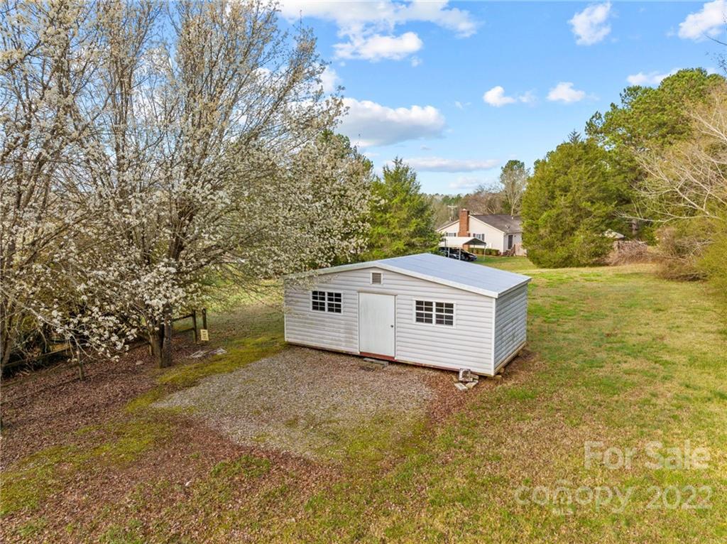 748 Bolick Road Indian Land, SC 29707 - Photo 28 of 39 a white house that has a tree in front of it
