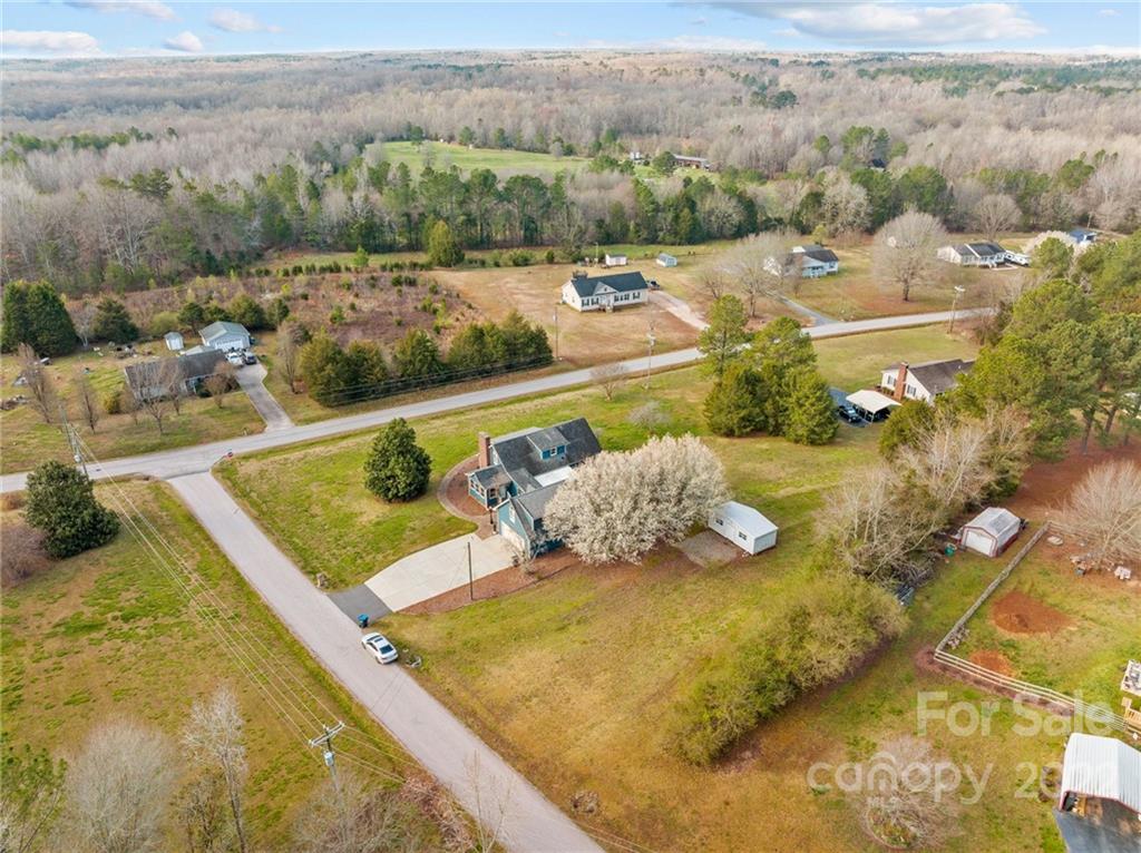 748 Bolick Road Indian Land, SC 29707 - Photo 37 of 39 a view of a swimming pool with a yard