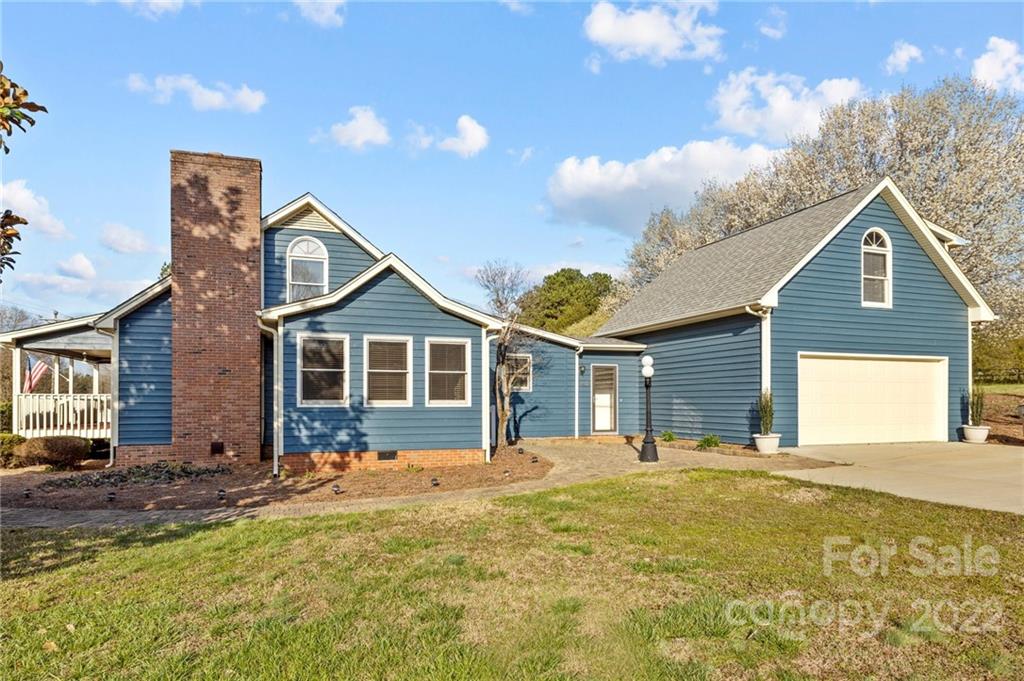 748 Bolick Road Indian Land, SC 29707 - Photo 4 of 39 a front view of a house with a yard