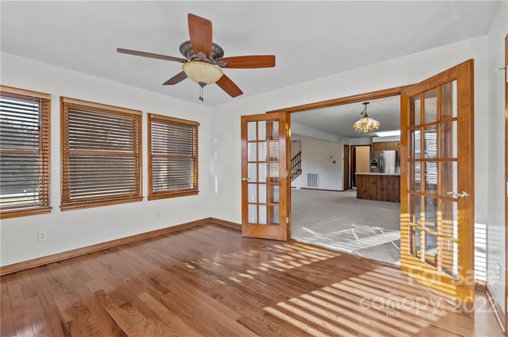 748 Bolick Road Indian Land, SC 29707 - Photo 7 of 39 a view of a livingroom with a furniture wooden floor and a window