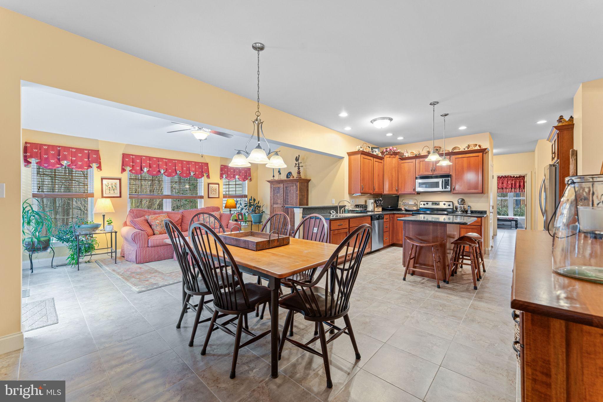 2881 Chestnut Hill Road Pottstown, PA 19465 - Photo 14 of 40 a view of a dining area with furniture window and outside view