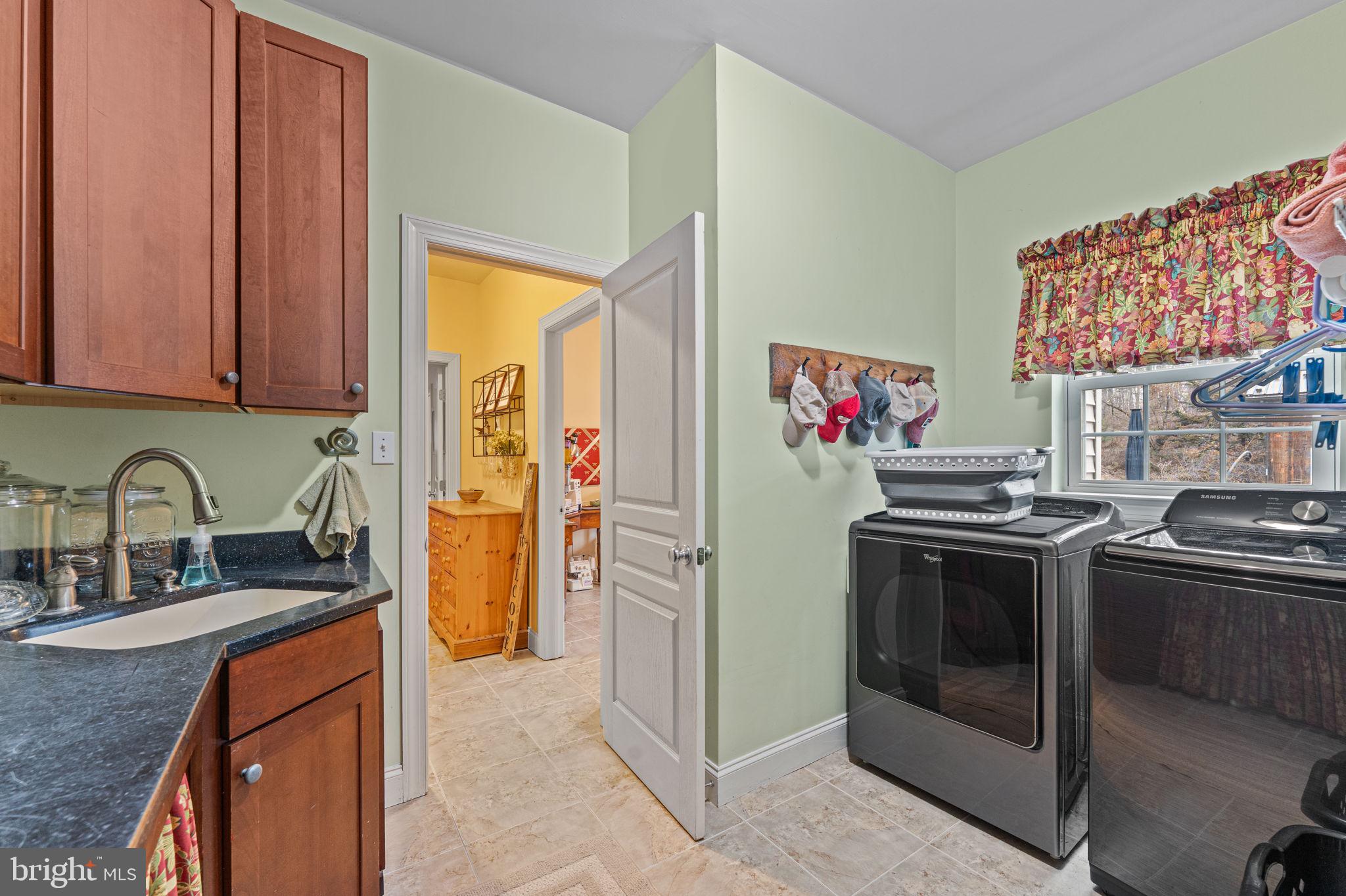 2881 Chestnut Hill Road Pottstown, PA 19465 - Photo 25 of 40 a kitchen with stainless steel appliances granite countertop a stove and a sink