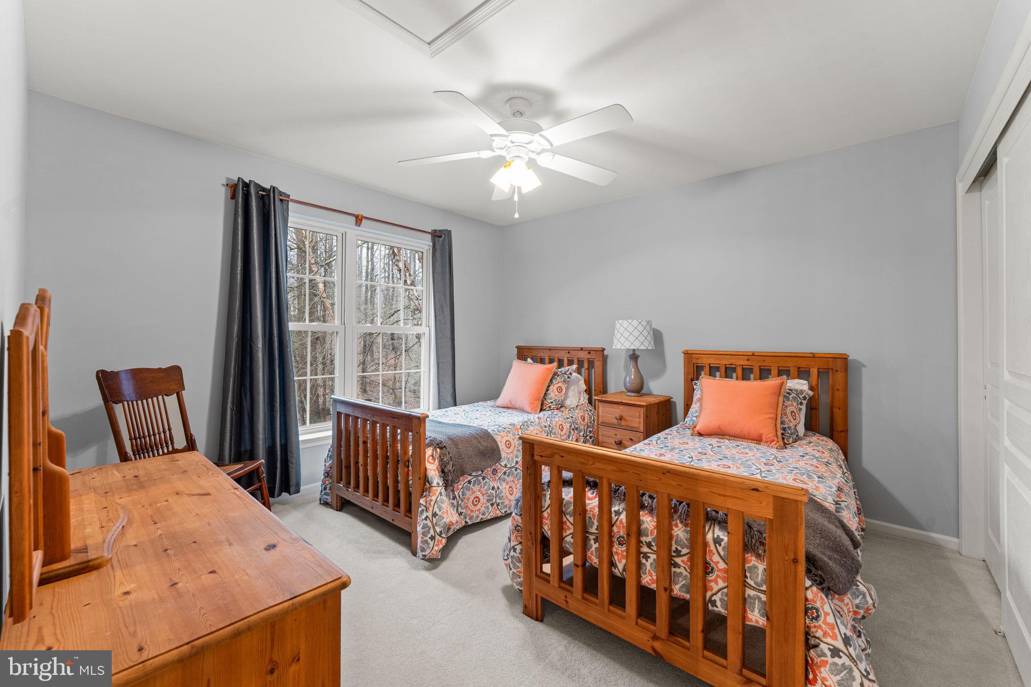 2881 Chestnut Hill Road Pottstown, PA 19465 - Photo 27 of 40 a bedroom with two beds and window