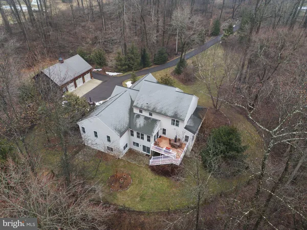 an aerial view of residential house with outdoor space