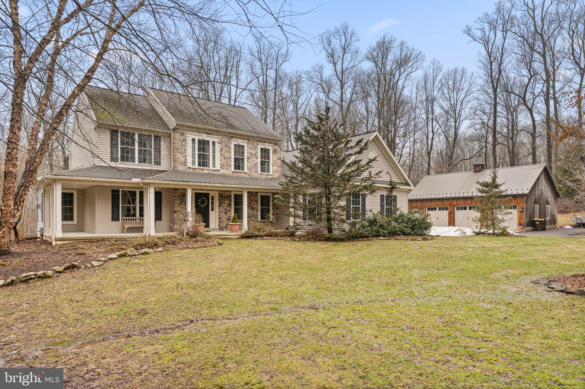 2881 Chestnut Hill Road Pottstown, PA 19465 - Photo 7 of 40 a front view of a house with a yard
