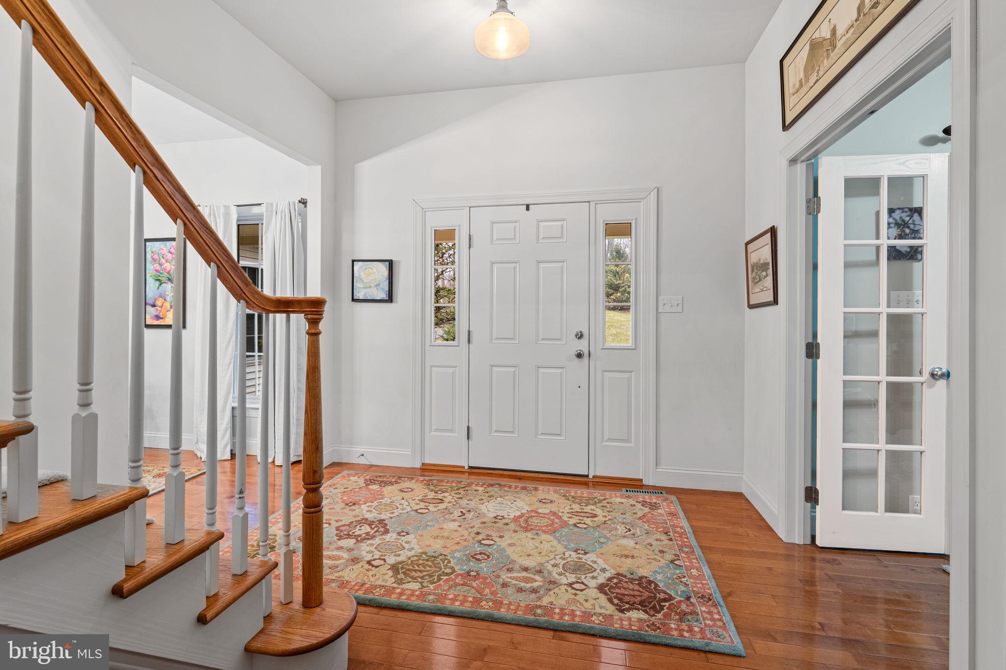 2881 Chestnut Hill Road Pottstown, PA 19465 - Photo 8 of 40 a view of an entryway with wooden floor and door