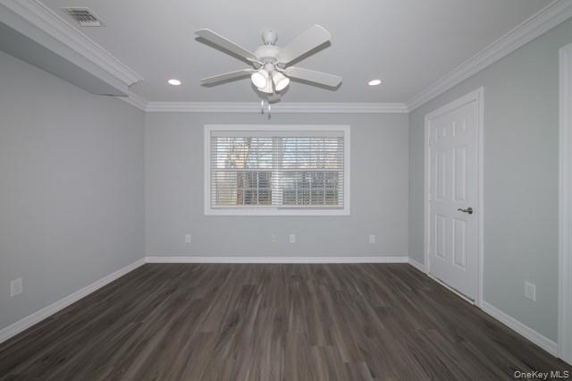 311 West Main Street, Unit 28 Patchogue, NY 11772 - Photo 6 of 9 wooden floor in an empty room with a window