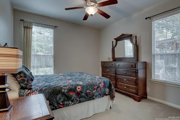 a view of a hallway view with staircase