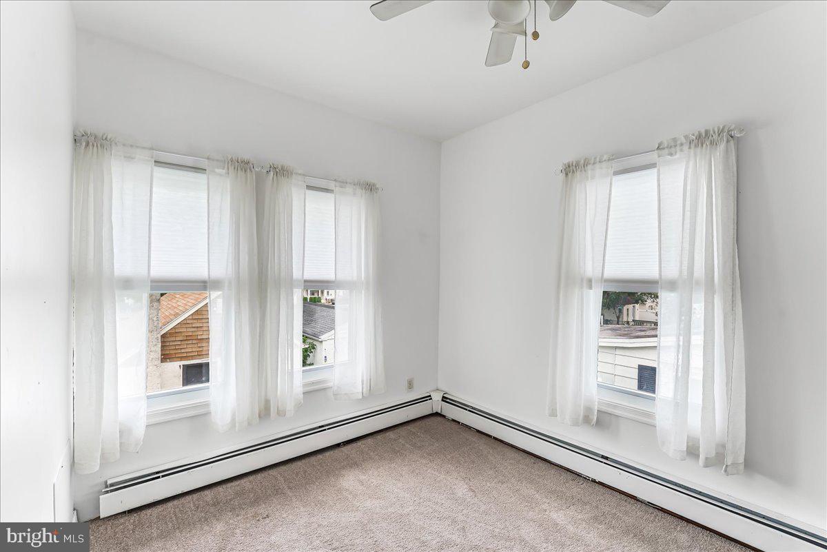 632 Taylor Avenue Upper Chichester, PA 19061 - Photo 16 of 20 a view of an empty room with a window