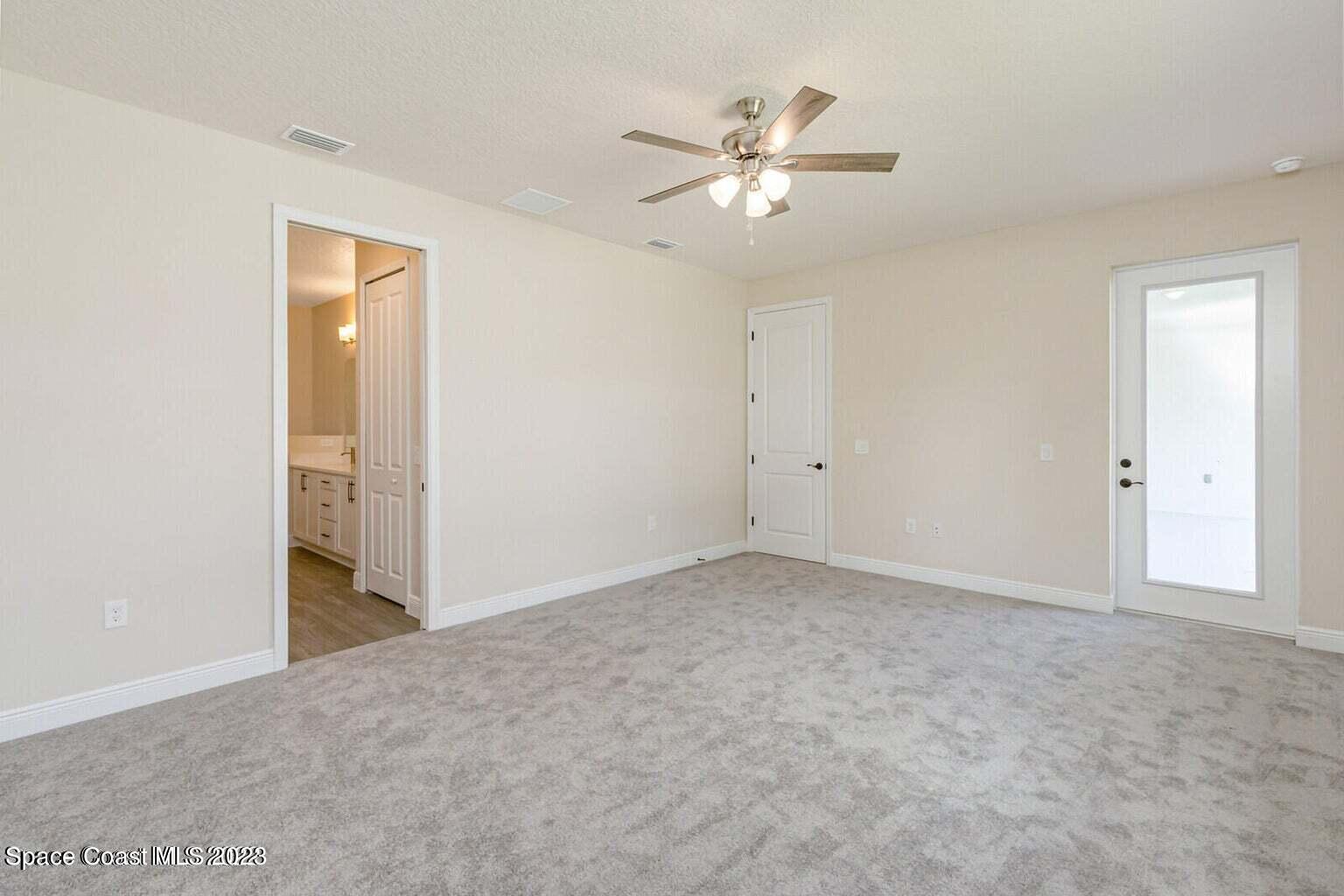 155 Decordre Road Southeast Palm Bay, FL 32909 - Photo 5 of 12 Master Bedroom