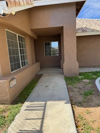 a front view of a house with garage