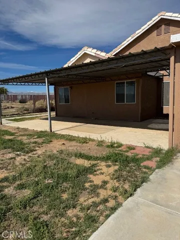 a front view of house with yard