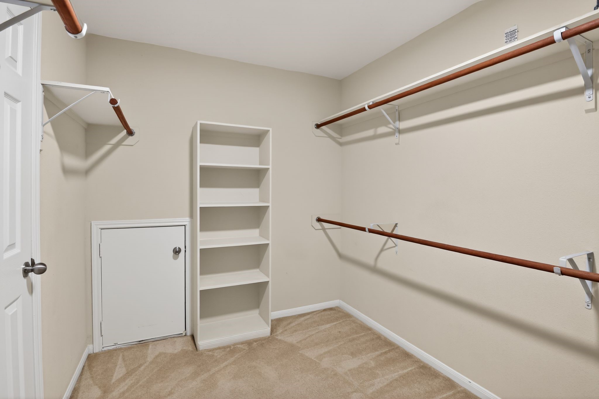 4938 Yearling Ridge Court Katy, TX 77449 - Photo 17 of 29 a view of an empty walk in closet