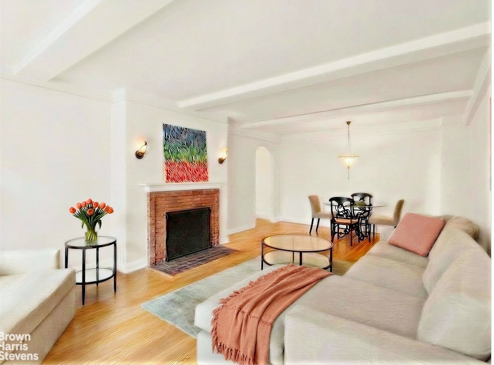 220 East 73rd Street, Unit 9H Manhattan, NY 10021 - Photo 2 of 15 a bedroom with a bed and a fireplace