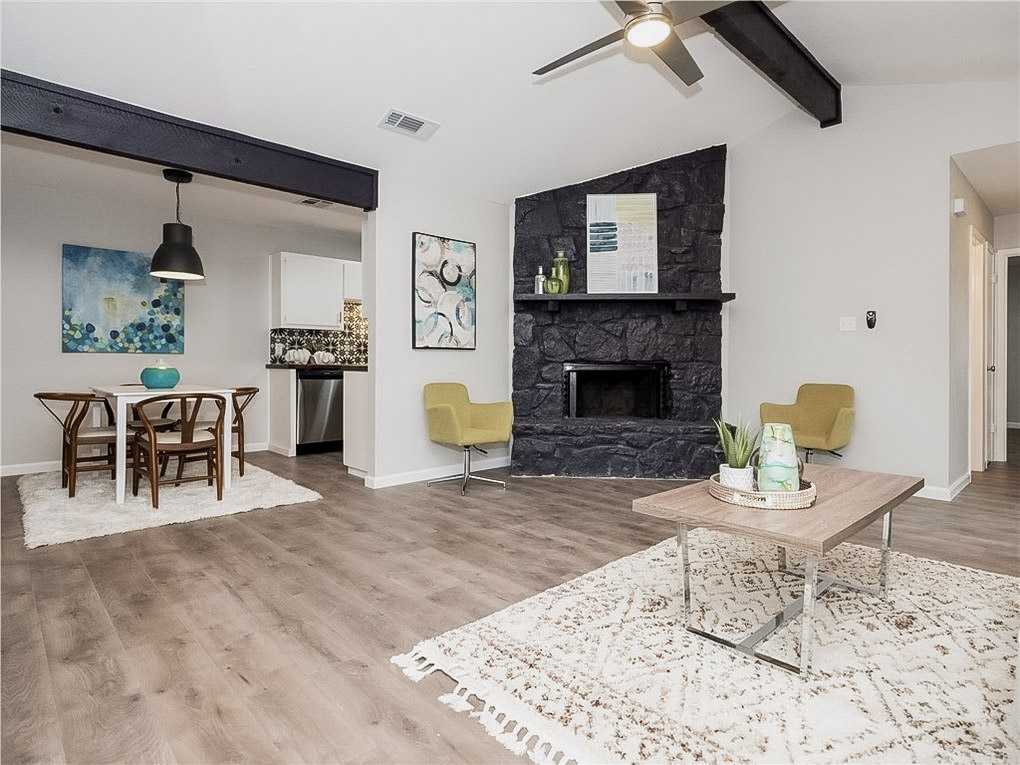 11118 Wandering Way Austin, TX 78754 - Photo 33 of 35 Unit A Living Room Open Concept floor plan with wood burning fireplace