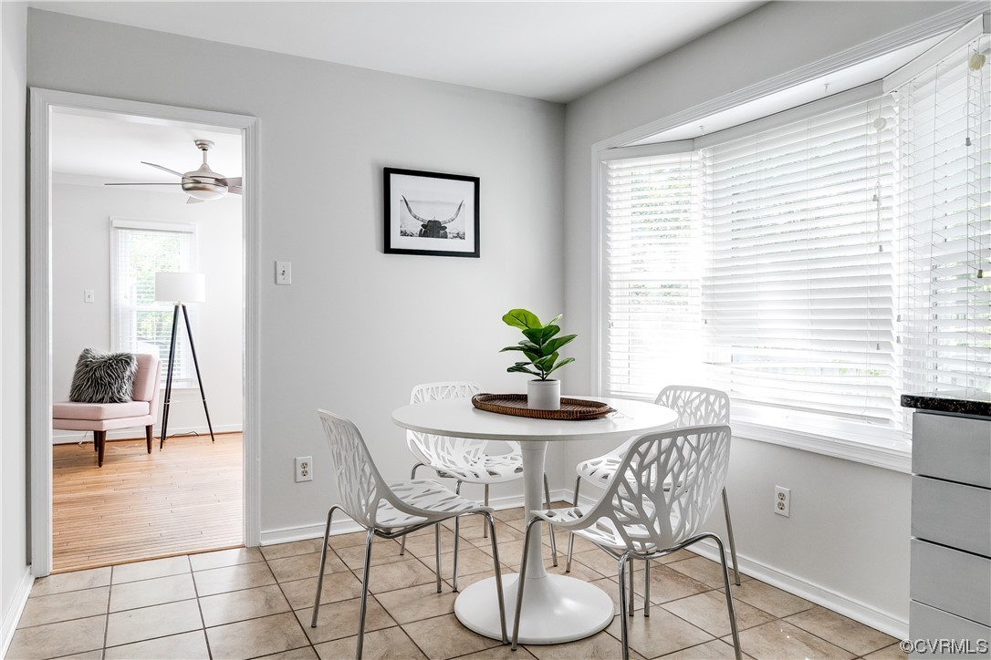 6007 Mill Spring Court Midlothian, VA 23112 - Photo 11 of 37 a view of a dining room with furniture and a potted plant