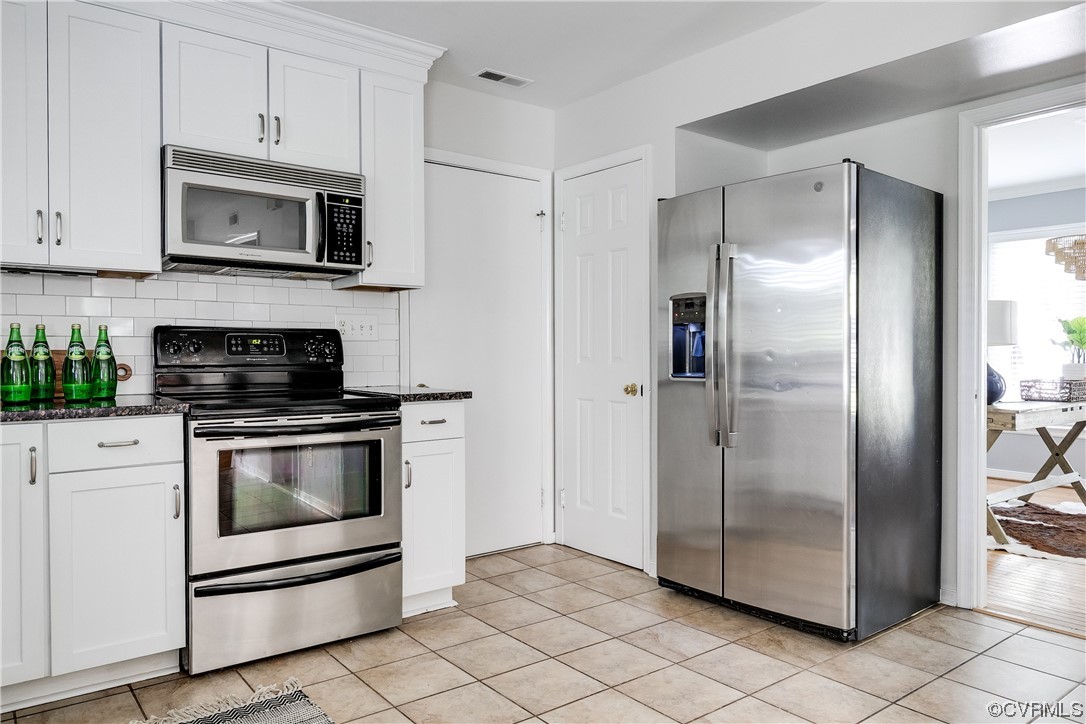 6007 Mill Spring Court Midlothian, VA 23112 - Photo 13 of 37 a kitchen with stainless steel appliances granite countertop a refrigerator and a stove top oven