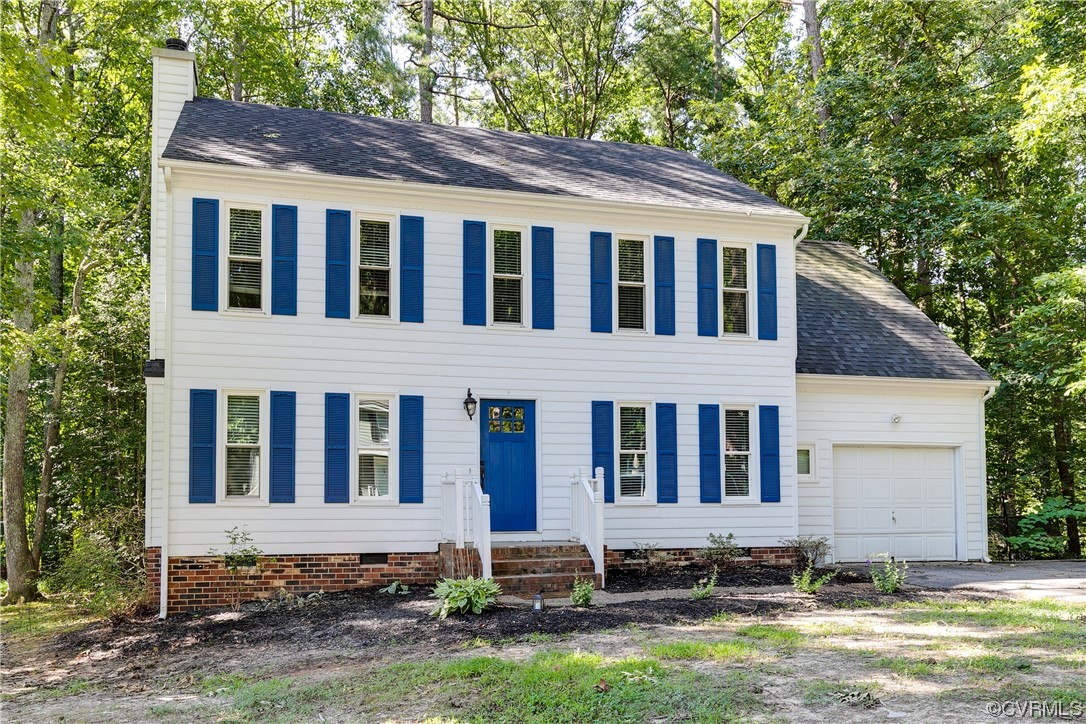6007 Mill Spring Court Midlothian, VA 23112 - Photo 2 of 37 a front view of a house with a yard