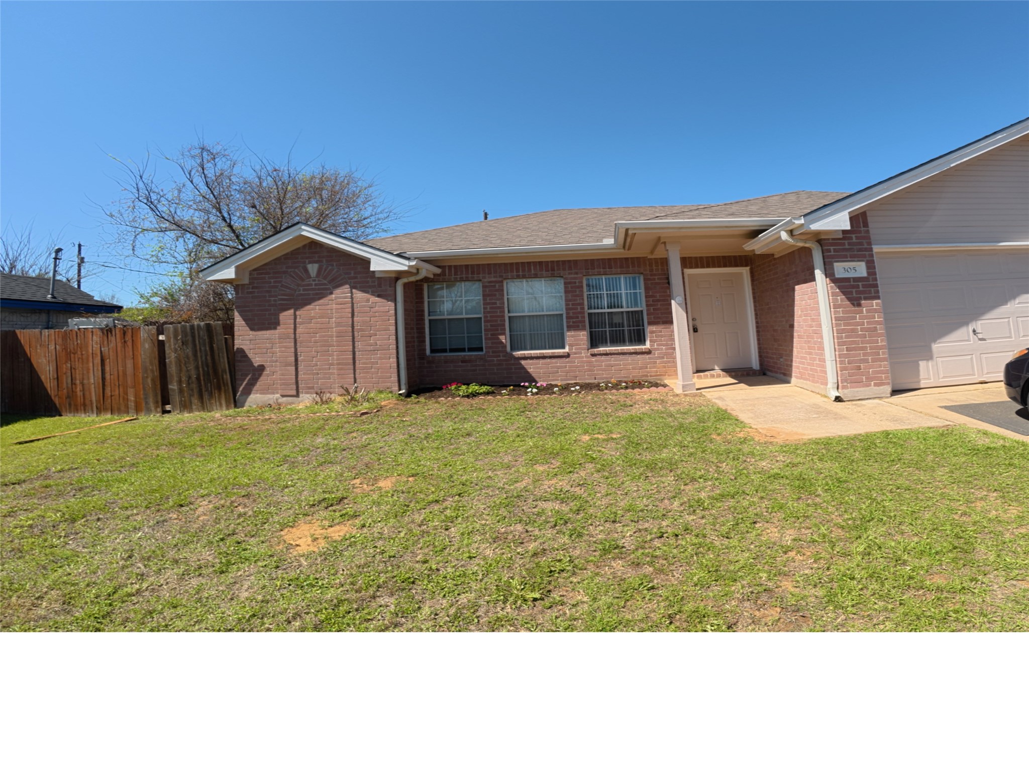 305 China Cove Elgin, TX 78621 - Photo 1 of 19 a view of a house with a yard and sitting area