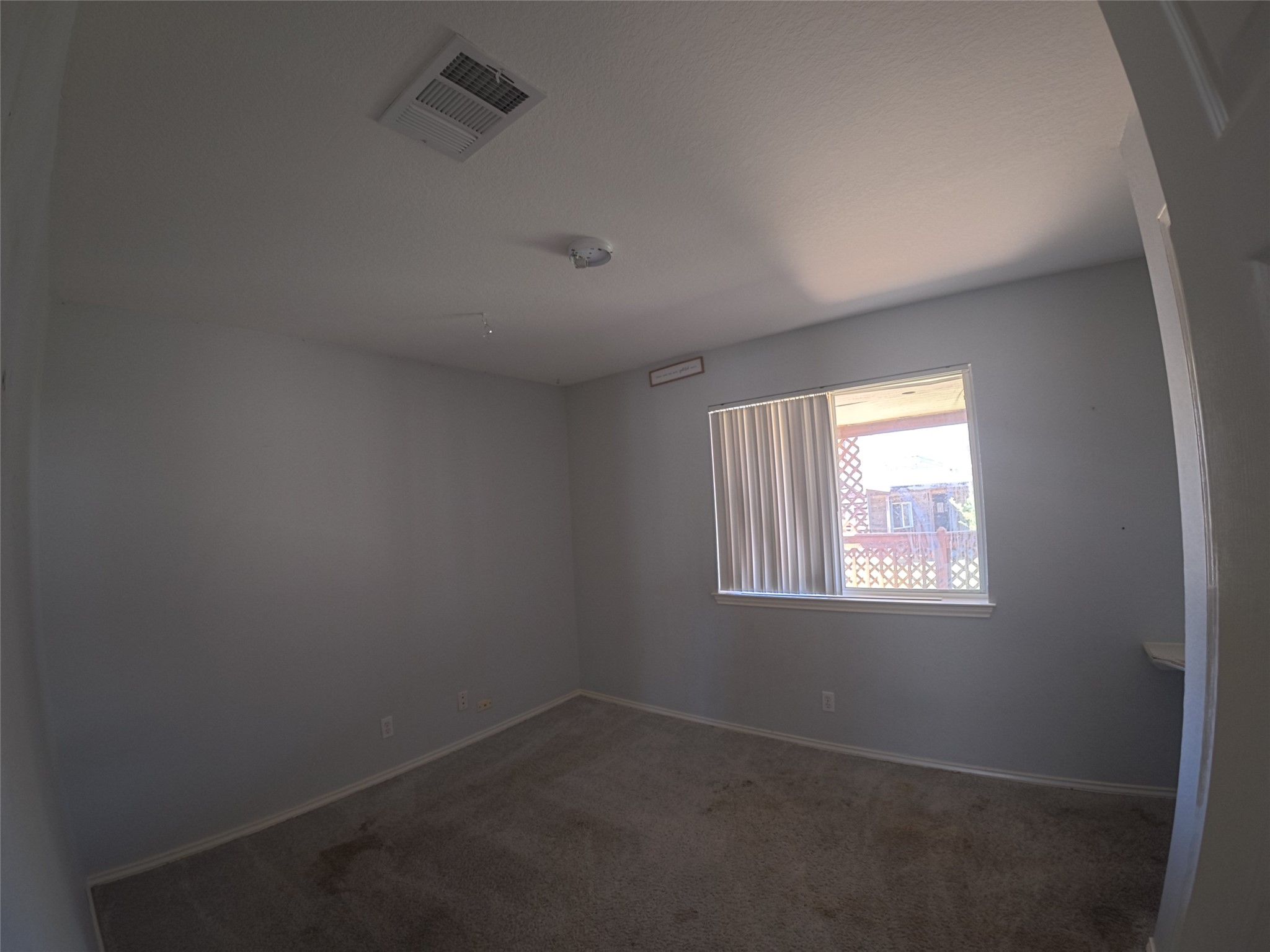 305 China Cove Elgin, TX 78621 - Photo 8 of 19 an empty room with windows