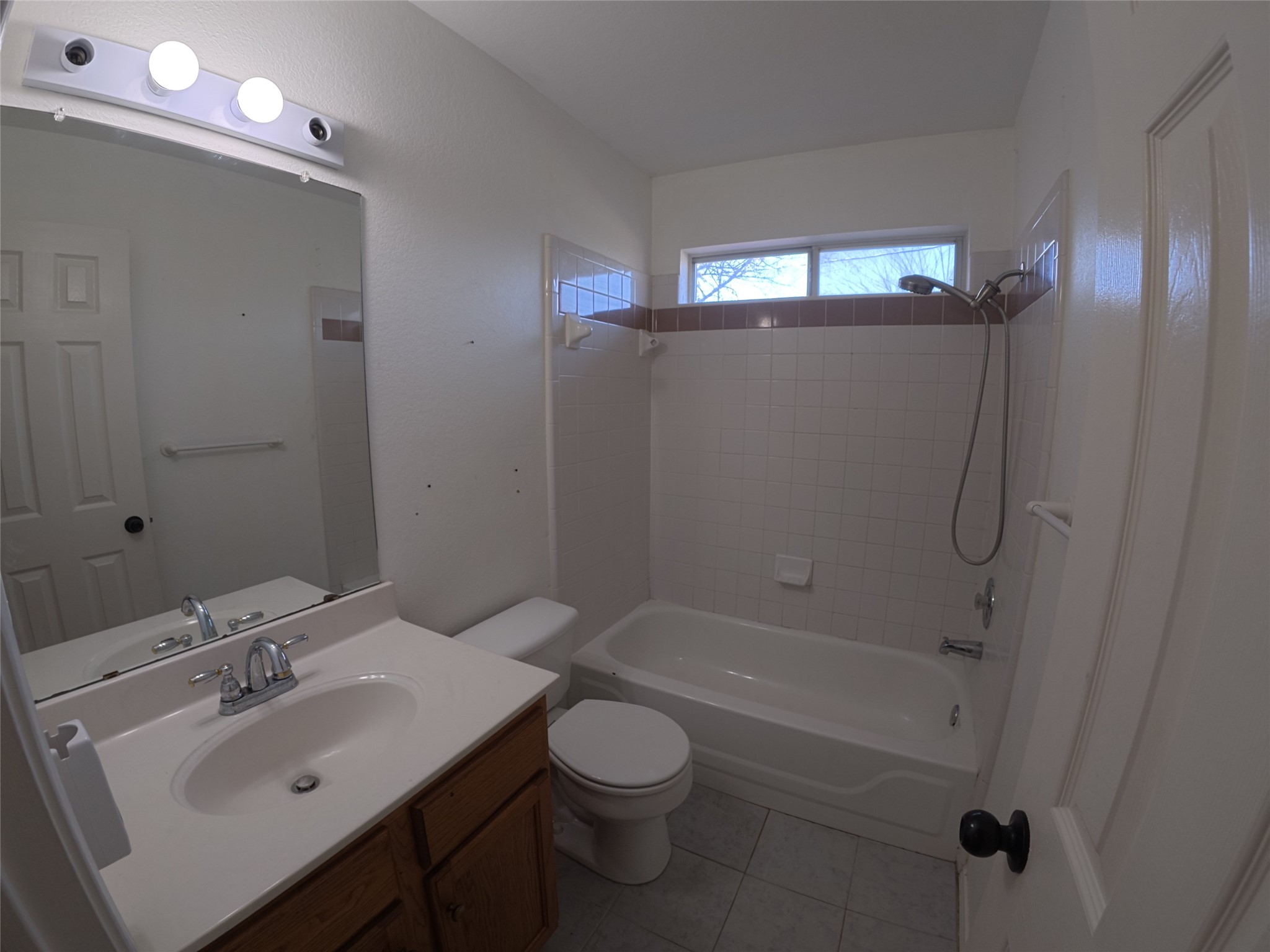 305 China Cove Elgin, TX 78621 - Photo 9 of 19 a bathroom with a sink toilet and shower