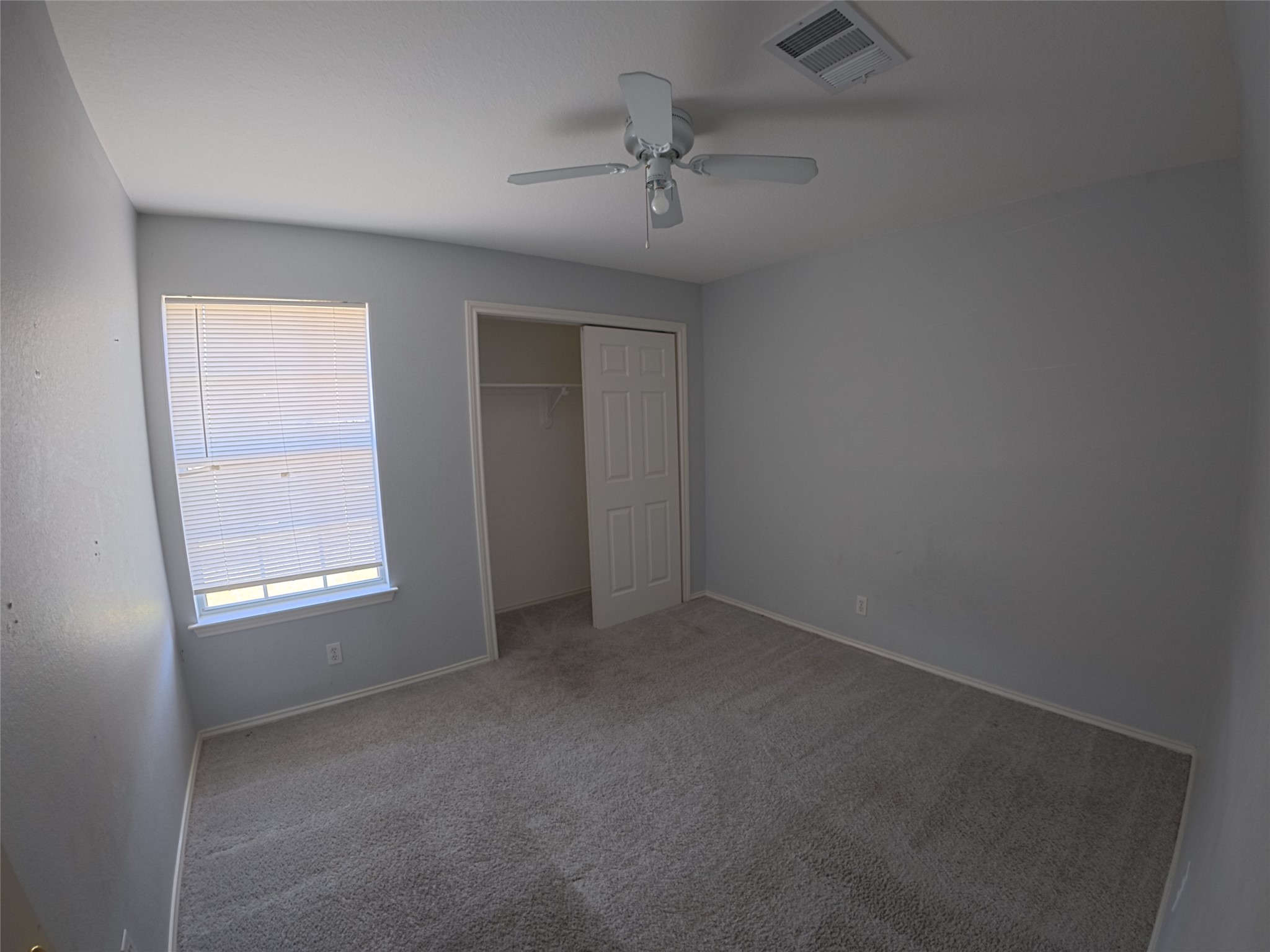 305 China Cove Elgin, TX 78621 - Photo 10 of 19 an empty room that has a window