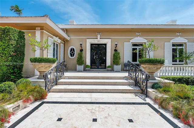 a front view of a house with a porch