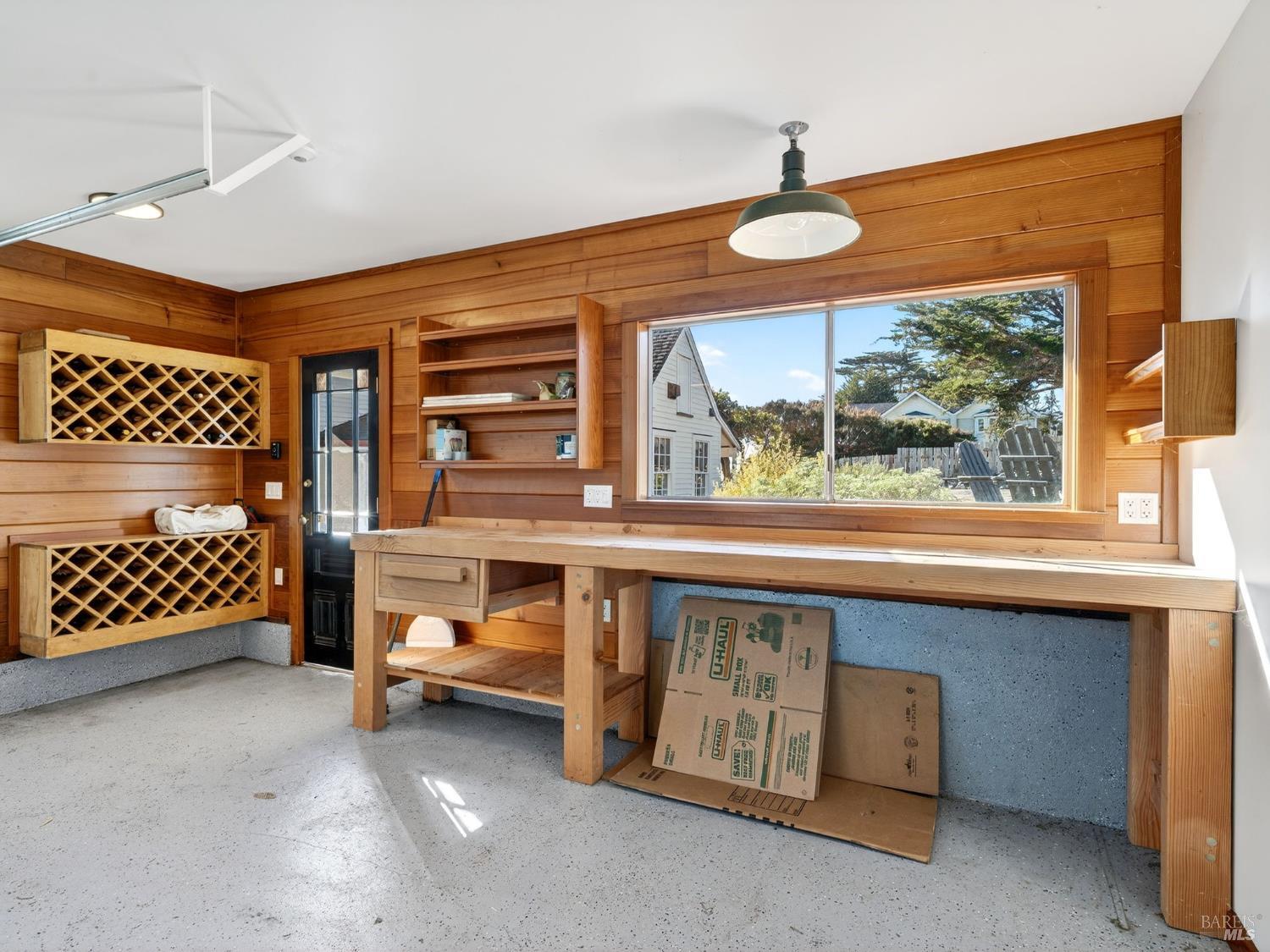 44900 Little Lake Road Mendocino, CA 95460 - Photo 45 of 54 Wine storage and work bench inside the garage