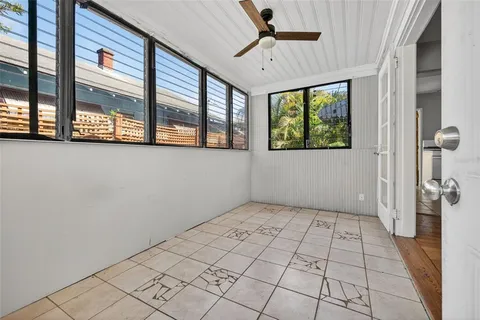 a view of a room with windows