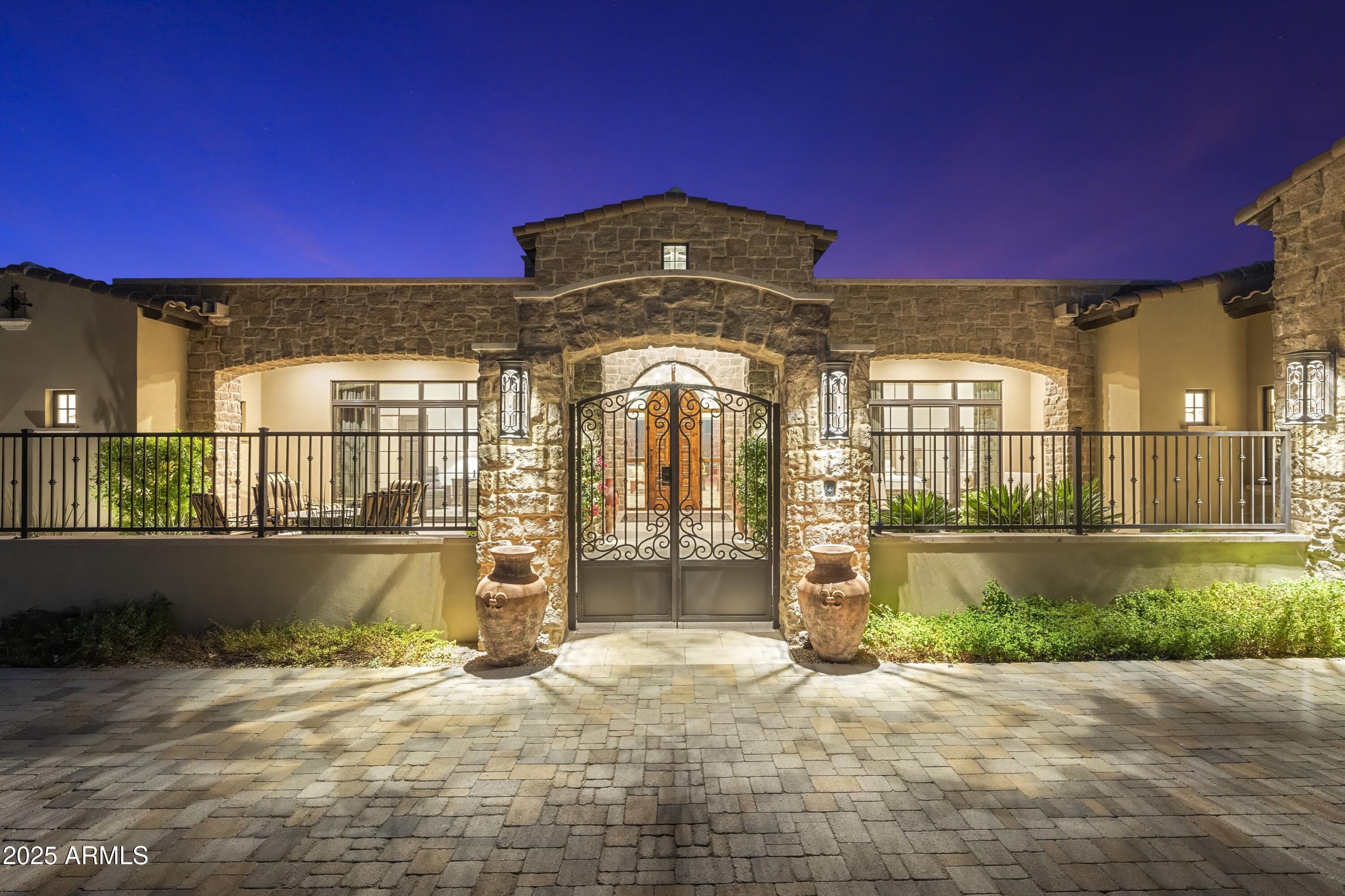 14699 East Paradise Drive, Unit 26 Scottsdale, AZ 85259 - Photo 16 of 73 a front view of a house with a yard
