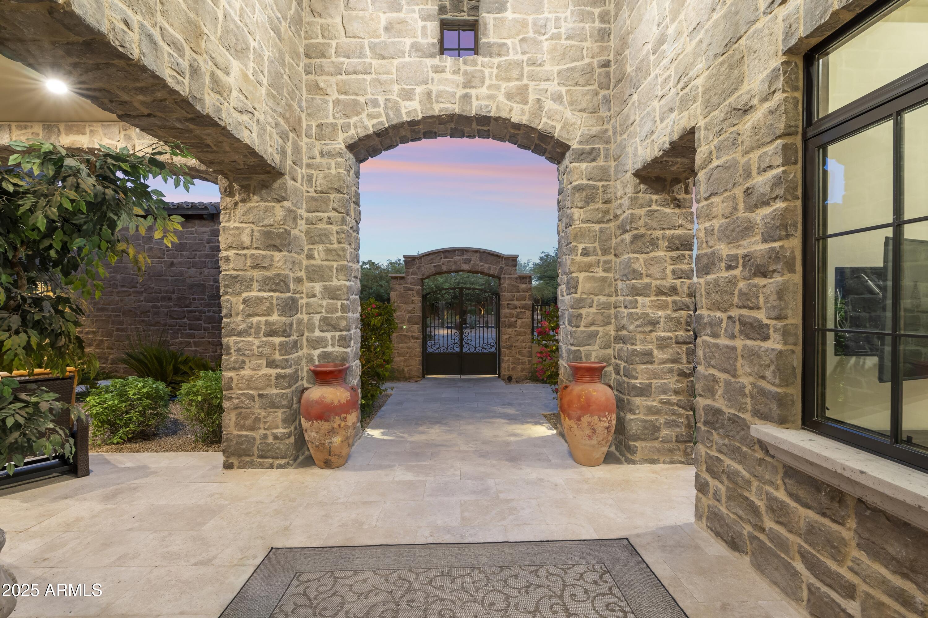14699 East Paradise Drive, Unit 26 Scottsdale, AZ 85259 - Photo 21 of 73 a front view of a house with a yard