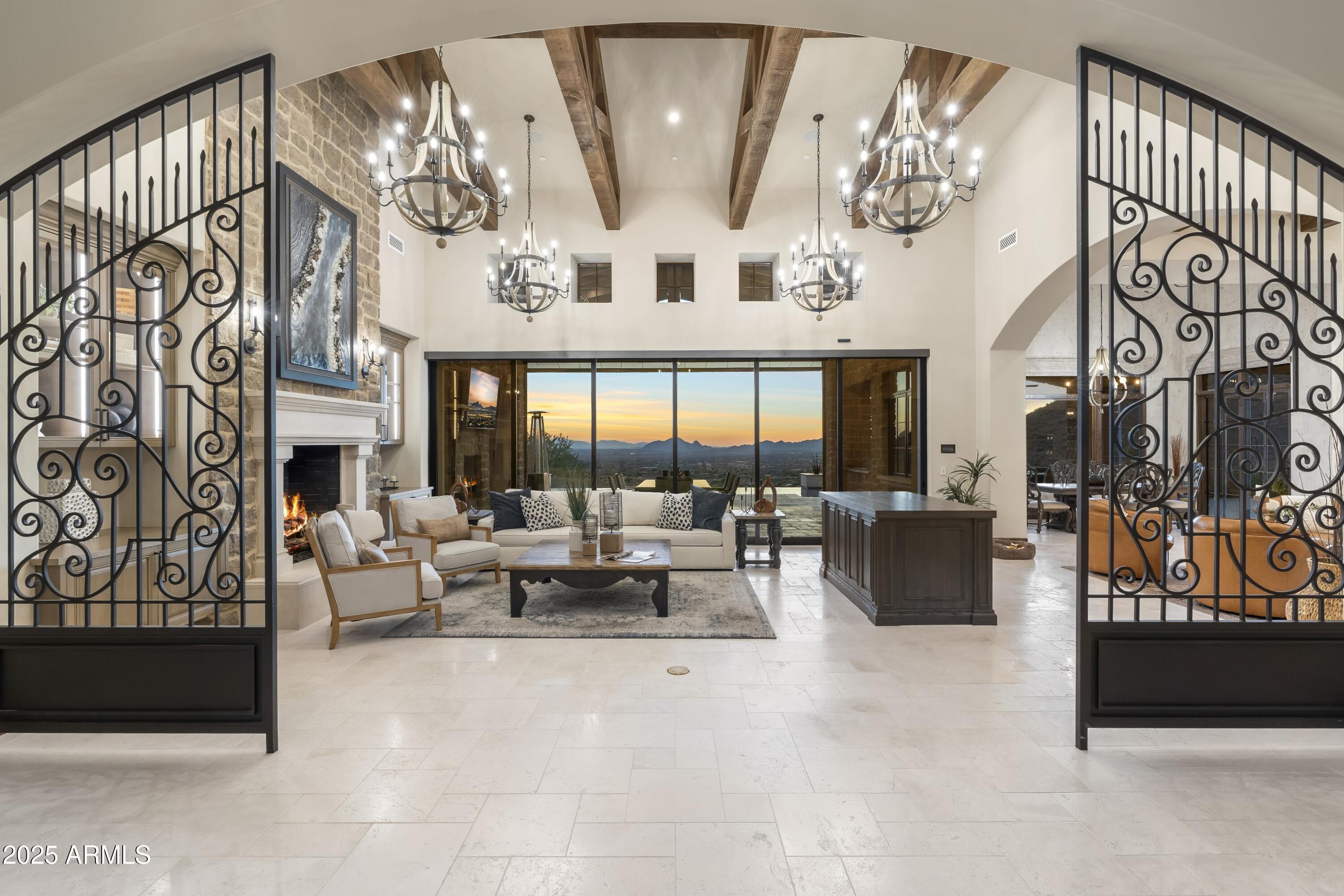 14699 East Paradise Drive, Unit 26 Scottsdale, AZ 85259 - Photo 24 of 73 a living room with fireplace furniture and a large window
