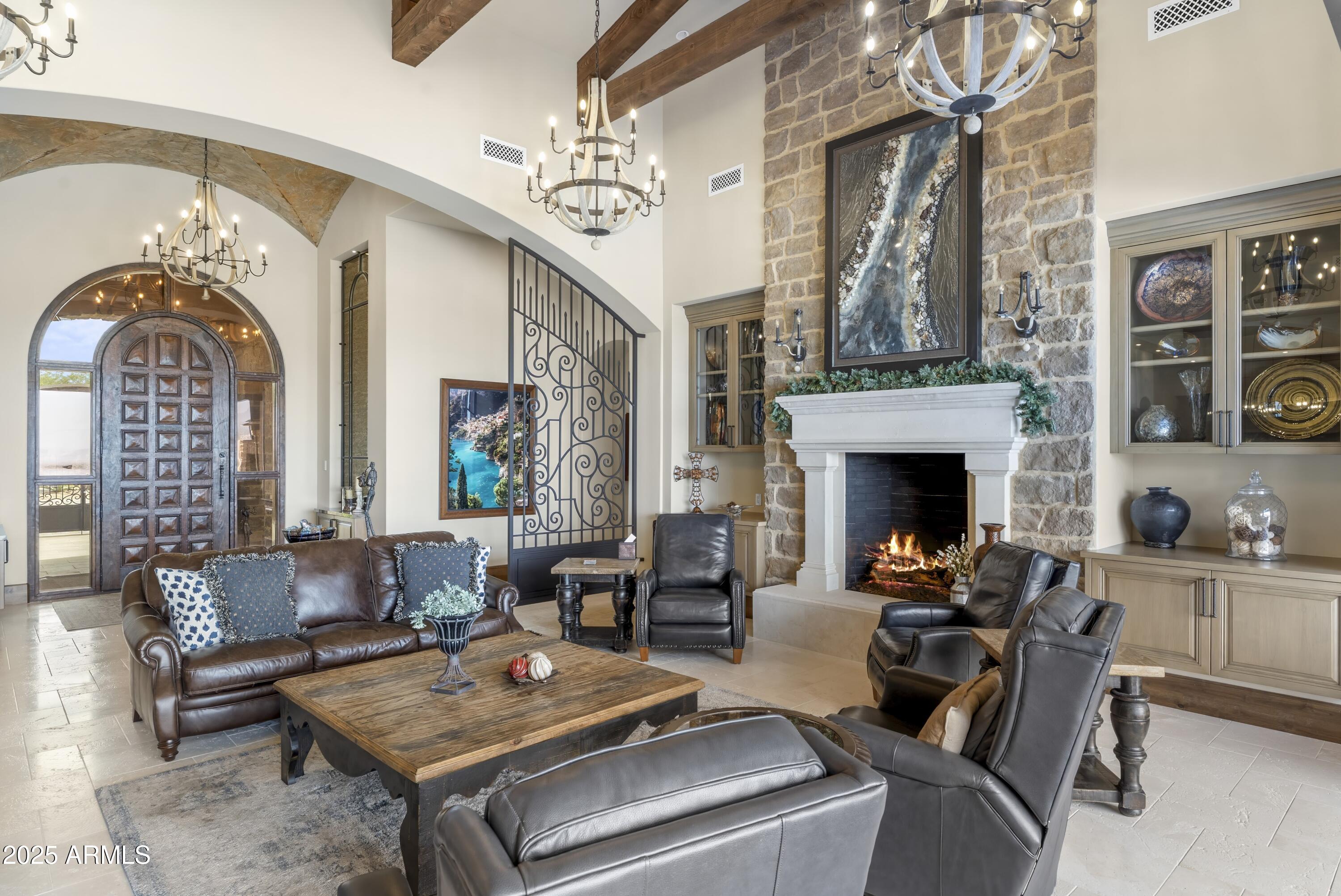 14699 East Paradise Drive, Unit 26 Scottsdale, AZ 85259 - Photo 27 of 73 a living room with furniture and a fireplace