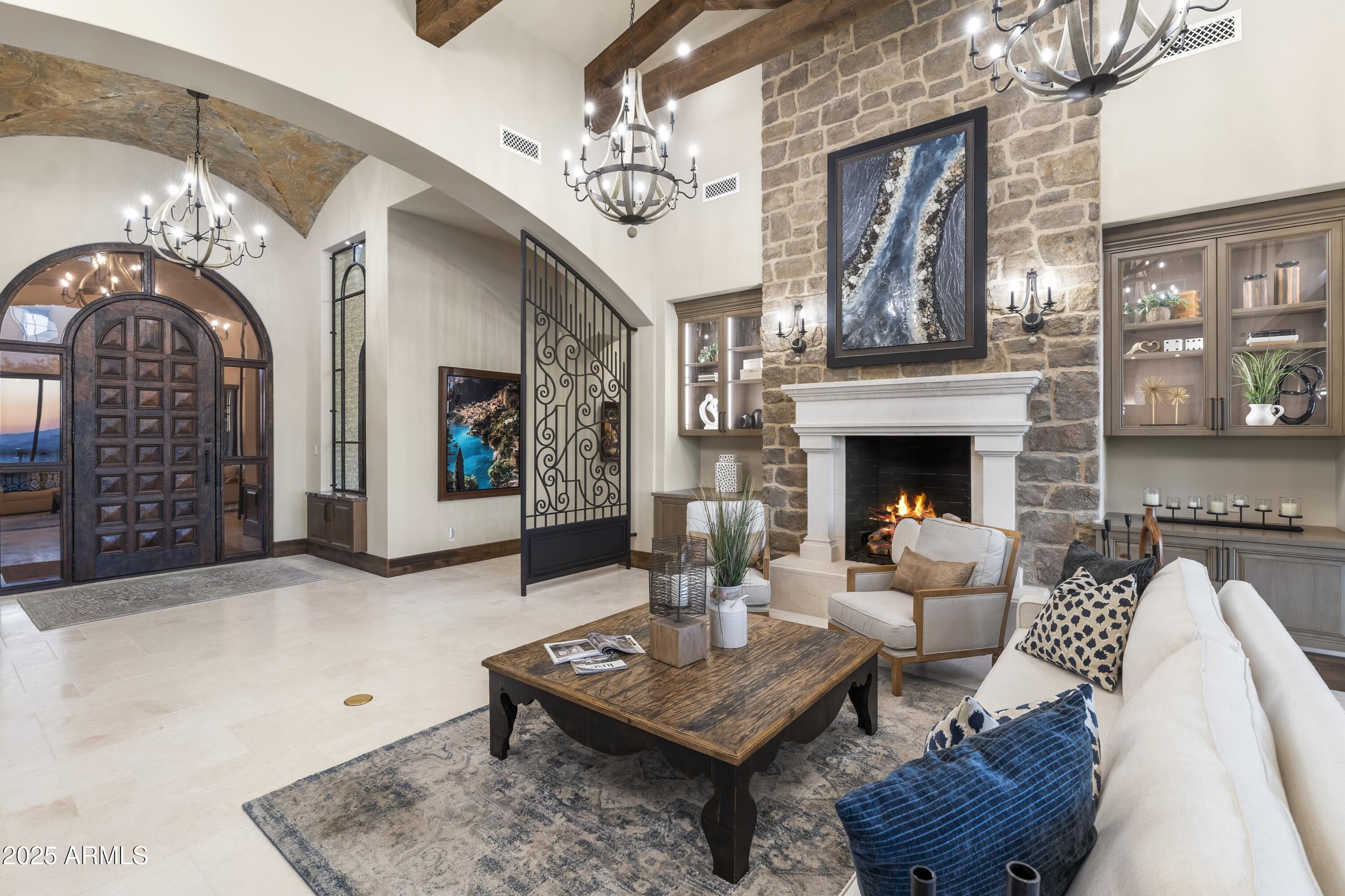 14699 East Paradise Drive, Unit 26 Scottsdale, AZ 85259 - Photo 31 of 73 a living room with furniture and a fireplace