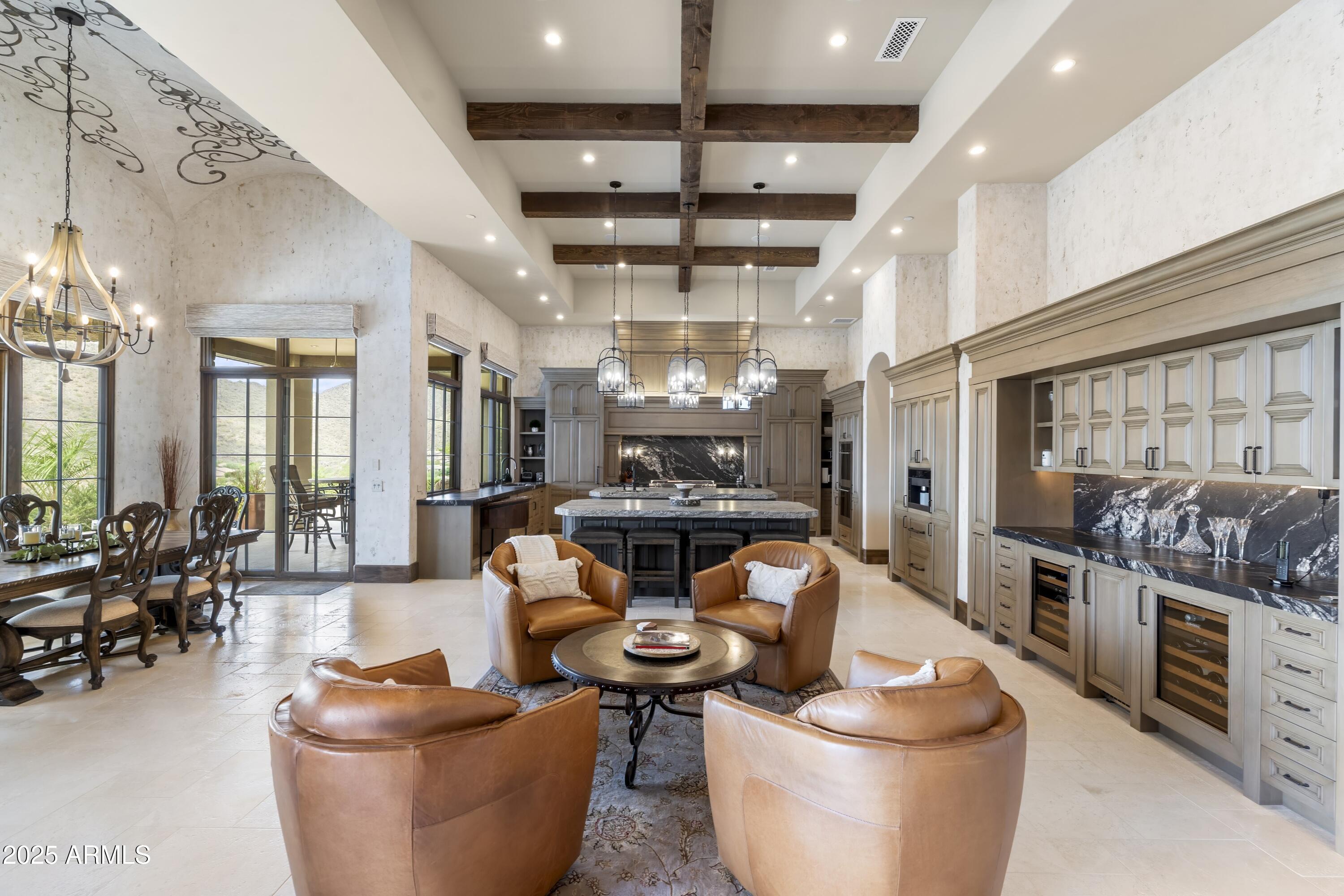 14699 East Paradise Drive, Unit 26 Scottsdale, AZ 85259 - Photo 33 of 73 a living room with fireplace furniture and a large window