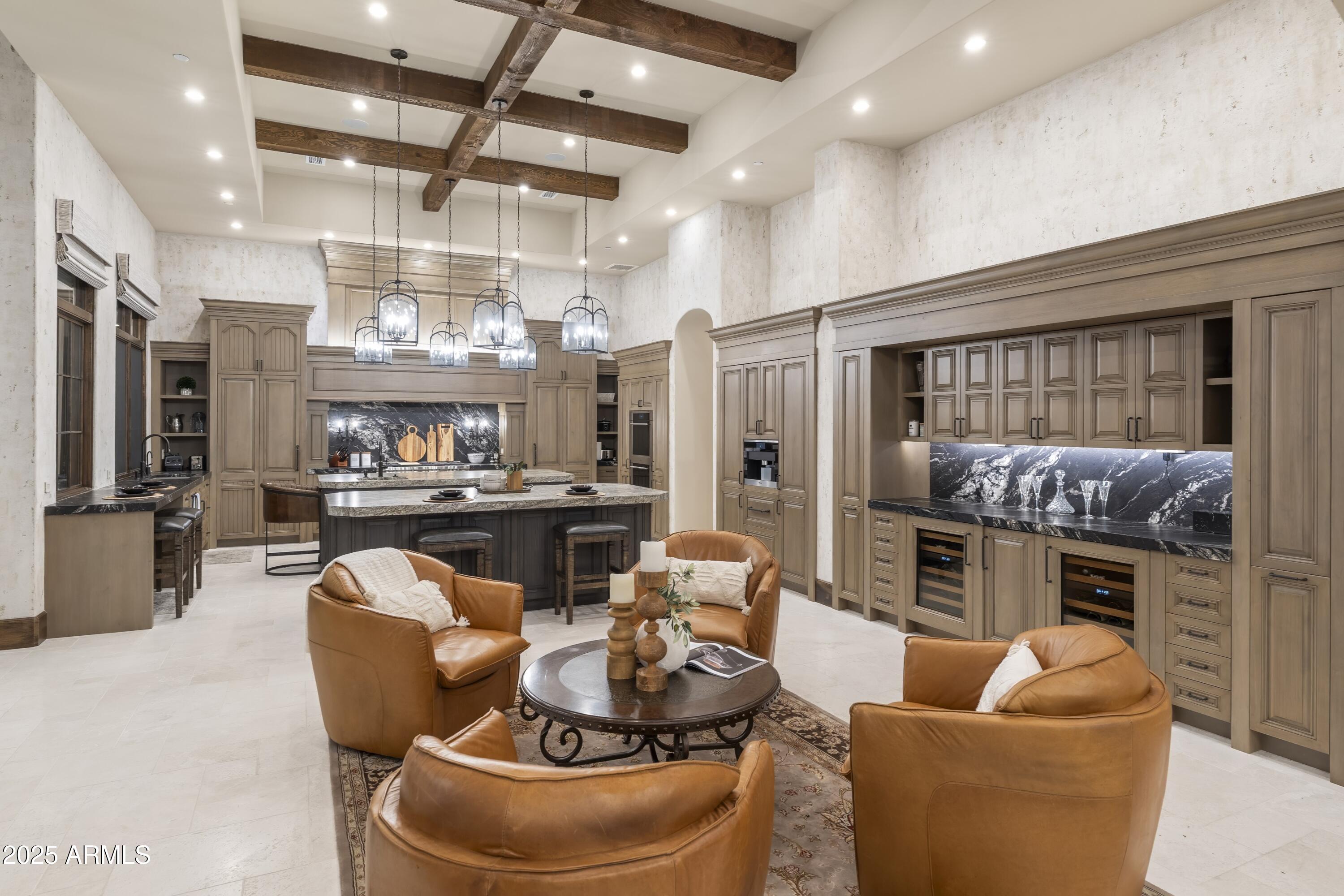14699 East Paradise Drive, Unit 26 Scottsdale, AZ 85259 - Photo 36 of 73 a living room with fireplace furniture and a view of kitchen