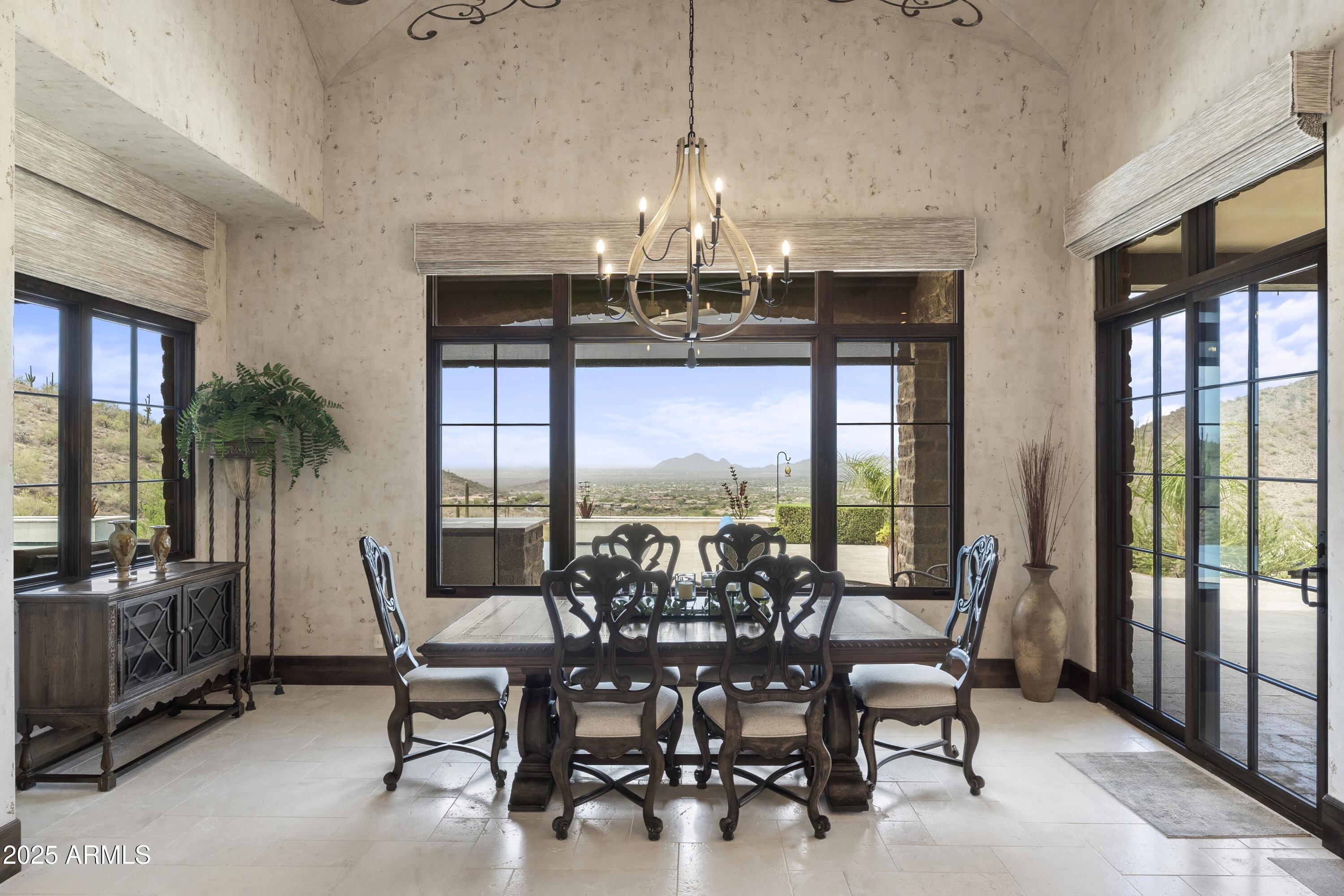 14699 East Paradise Drive, Unit 26 Scottsdale, AZ 85259 - Photo 39 of 73 a view of a dining room with furniture window and outside view